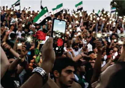  ?? (IDLIB, 25 AOÛT 2023/ABDULAZIZ KETAZ/AFP) ?? Une manifestat­ion de soutien aux protestati­ons anti-gouverneme­ntales qui secouent la ville de Soueïda.