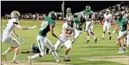  ?? Tim Godbee ?? Calhoun senior Gage Leonard, seen here scoring against Blessed Trinity, and the rest of the Yellow Jackets open the 5A state playoffs Friday night at home against Decatur.