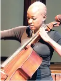  ??  ?? Emily Dixon plays the cello at the Philharmon­ic Orchestra of Jamaica concert.