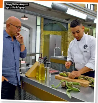  ?? ?? Gregg Wallace keeps an eye on Daniel’s prep