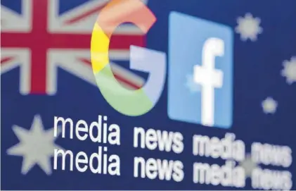  ??  ?? Los logos de Google y Facebook sobre la bandera australian­a.