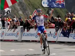  ?? (EPA) ?? Thibaut Pinot crosses the line to win stage 14 of the Tour de France