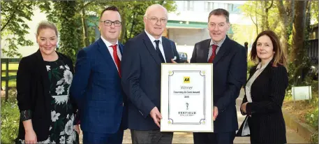  ??  ?? Sales marketing manager, Kate Kavanagh, deputy general manager, Patrick Kickham-Lennon, AA hospitalit­y manager, Declan Connors accepting the award general manager, Micheal Cunningham and operations director, Rita Barcoe.