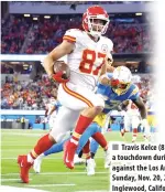  ?? AFP PHOTO ?? Travis Kelce (87) of the Kansas City Chiefs scores a touchdown during the fourth quarter in the game against the Los Angeles Chargers at SoFi Stadium on Sunday, Nov. 20, 2022 (November 21 in Manila), in Inglewood, California.