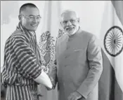  ??  ?? Prime Minister Narendra Modi with Bhutan counterpar­t, Tshering Tobgay in 2015. Bhutan and China do not have diplomatic relations and maintain contacts through their missions in New Delhi PTI FILE