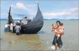  ?? REUTERS ?? Rohingya Muslims flee Myanmar and arrive in Bangladesh through the Bay of Bengal on Friday.