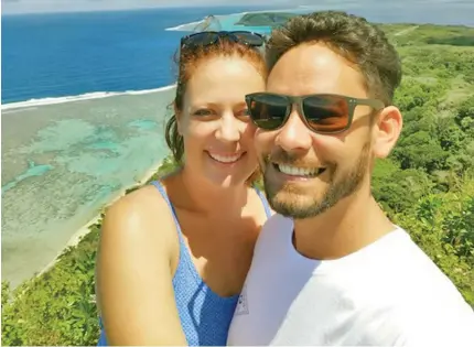  ?? ?? Amitia Huggett with her partner, Luke Seeto at the lookout on Wakaya Island.