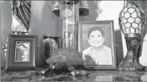  ?? BRIAN CASSELLA/CHICAGO TRIBUNE ?? A photo of Lupe Rios, Sabine Gonzalez’s grandmothe­r, sits in her family’s home Tuesday. Rios died from COVID-19 during the summer.