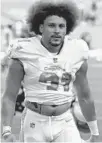  ?? JOHN MCCALL/ SOUTH FLORIDA SUN SENTINEL ?? Dolphins running back Phillip Lindsay walks off the field after beating the Panthers on Sunday at Hard Rock Stadium.