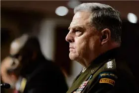  ?? Andrew Harnik / AP ?? Chairman of the Joint Chiefs of Staff Gen. Mark Milley appears at a Senate Armed Services hearing on June 10.