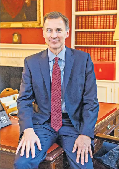  ?? ?? Jeremy Hunt in his office at 11 Downing Street. The Chancellor has downplayed the chance of tax cuts until the Government has a grip on inflation