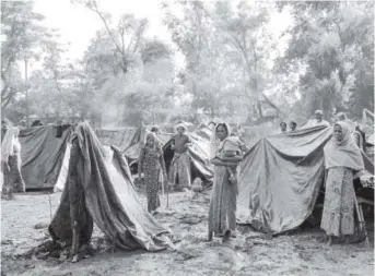  ?? Ismail Ferdous, Special to The Washington Post ?? A makeshift Rohingya refugee camp sits on the way to Teknaf from Cox’s Bazar, Bangladesh.