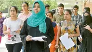  ??  ?? Students enter the exam hall to answer the TS Eamcet 2018.