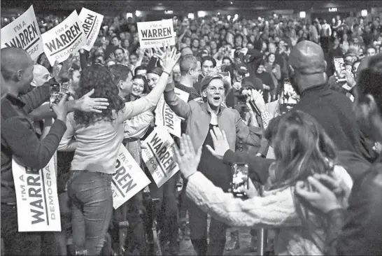  ?? BEBETO MATTHEWS/AP ?? Presidenti­al candidate Sen. Elizabeth Warren, D-Mass., arrives at a campaign event Tuesday in New York. The website Voteview has rated her the most liberal member of Congress.