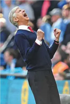  ?? Reuters ?? Arsene Wenger celebrates after Arsenal defeated Manchester City in the FA Cup semi-final at the Wembley Stadium on Sunday. Arsenal won 2-1.