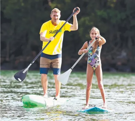  ?? Picture: ADAM HEAD ?? Anthony Clark and daughter Saharah, 10, at Tallebudge­ra Creek.