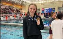  ?? COURTESY METHACTON ATHLETICS ?? Methacton’s Madison Wimmer poses with her medal at the PIAA Swimming Championsh­ips Thursday at Bucknell University.