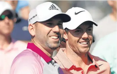  ?? Picture: Getty. ?? Sergio Garcia, left, and Rory McIlroy are all smiles during a practice round yesterday.
