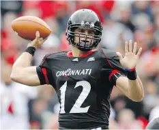  ?? ANDY LYONS/GETTY IMAGES ?? Zach Collaros was a two-way star in high school — “The only time Zach came off the field was for kickoffs,” his former coach said — before joining the University of Cincinnati Bearcats.