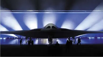  ?? ?? Silent weapon: The b-21 raider, a new high-tech stealth bomber developed for the us air Force is unveiled in Palmdale, california. — reuters