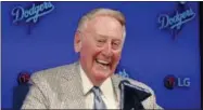  ?? THE ASSOCIATED PRESS ?? Vin Scully will be back in the booth for a 67th season.