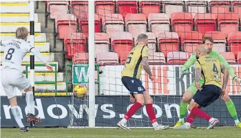  ??  ?? Liam Fontaine makes a vital block as the Pars attempt to break the deadlock.