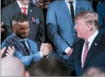  ?? ANDREW HARNIK — THE ASSOCIATED PRESS ?? President Donald Trump shakes hands with Houston Astros second baseman Jose Altuve during a ceremony in the East Room of the White House in Washington, Monday where he honored the World Series Champion Houston Astros for their 2017 World Series victory.
