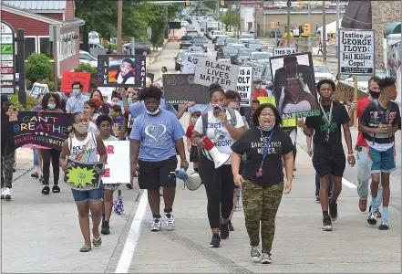  ?? PETE BANNAN - MEDIANEWS GROUP ?? Marchers in support of Black Lives Matter makes their way west on Gay Street in West Chester on Saturday morning.