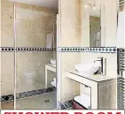  ??  ?? SHOWER ROOM Beautifull­y tiled walls, floors and units