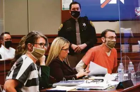  ?? Paul Sancya / Associated Press ?? Jennifer Crumbley (left) and James Crumbley (right), the parents of a teenager accused of killing four students, appear in court in Rochester Hills, Mich.