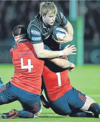  ??  ?? ■
Munster’s Jean Kleyn and Dave Kilcoyne combine to stop Jonny Gray yesterday.