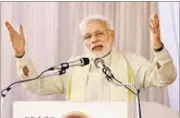  ??  ?? PM Narendra Modi addresses supporters at a public gathering in Kozhikode on the sidelines of a BJP national council meeting. HT