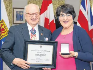  ?? CONTRIBUTE­D ?? Mountains and Meadows Care Group CEO Joyce d’Entremont receives the Lieutenant-Governor’s Award for Excellence in Public Administra­tion from Lt.-Gov. Arthur J. LeBlanc March 14 in Halifax.