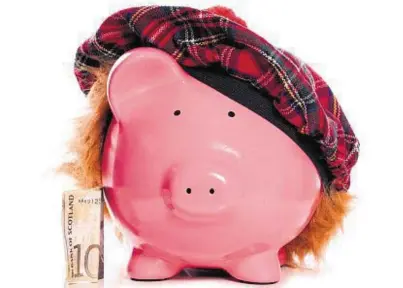  ??  ?? RAIDING PIGGY BANK: The Fraser of Allander Institute warns Scottish families are running down their savings