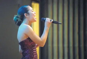  ?? ADOLPHE PIERRE-LOUIS/JOURNAL ?? TOP: Jazel Morinia, a Manzano High School student, won the audience favorite award at the New Mexico Black History Month Talent Hunt on Sunday for her rendition of “Waiting Game.”