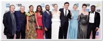  ??  ?? Cast and crew... Tom Felton, producer Rick McCallum, Terry Pheto, director Amma Asante, David, Rosamund, Jack Davenport, Laura Carmichael, Jessica Oyelowo and Arnold Oceng at the premiere of A United Kingdom in London