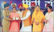  ?? ANI ?? CM Bhagwant Mann along with his wife Dr Gurpreet Kaur during an event at Government Girls College in Patiala on Monday.