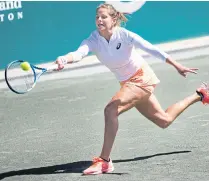  ??  ?? Julia Goerges stretches for a forehand return against Naomi Osaka.