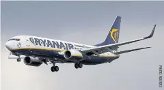  ??  ?? A Ryanair plane prepares to land at Manchester Airport in northern England, March 31, 2016.