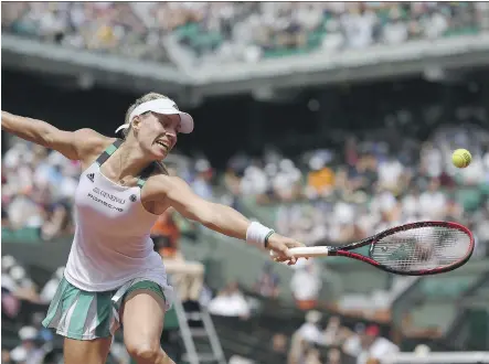  ?? LIONEL BONAVENTUR­E/GETTY IMAGES ?? Top seed Angelique Kerber lasted only two sets in this year’s French Open, losing to Ekaterina Makarova Sunday.