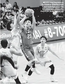  ?? PHOTO BY BOB DUNGO JR. ?? DLSU’s Jeron Teng drives on Paul Varella of UE during a UAAP men’s basketball game at the Mall of Asia Arena in Pasay City.