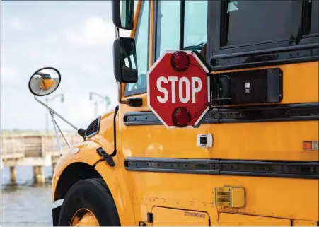  ?? SUBMITTED PHOTO ?? School buses are sharing the roads with other vehicles as students begin a new school year.