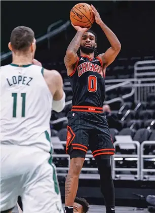  ?? TWITTER. COM/ CHICAGOBUL­LS ?? Guards Zach LaVine ( left) and Coby White combined for nine turnovers Friday night in the Bulls’ 126- 96 loss to the Bucks in Milwaukee.