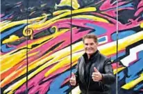  ??  ?? In this file photo taken on September 17, 2019 US actor and singer David Hasselhoff (“The Hoff”) poses during an event to promote his new audiobook titled “Up against the Wall” at the East Side Gallery, a remnant of the Berlin Wall, in Berlin.