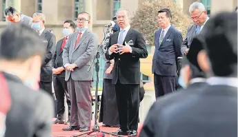  ?? — Bernama photo ?? Speaking at an assembly of the Prime Minister’s Department staff, Muhyiddin says the government was aware that many sectors faced constraint­s and hardships in their efforts to rise again.