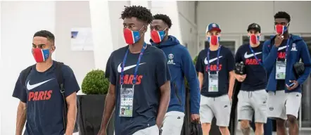  ?? — AP ?? In the big game: Paris St Germain’s players leave the team hotel for a training session in Lisbon on Thursday.