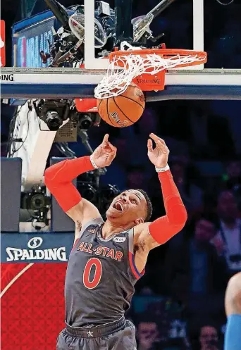  ?? [AP PHOTO] ?? Western Conference guard Russell Westbrook of the Oklahoma City Thunder dunks during the first half of the NBA All-Star Game on Sunday night in New Orleans.