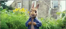  ?? COLUMBIA PICTURES/SONY VIA AP, FILE ?? This image released by Columbia Pictures shows Peter Rabbit, voiced by James Corden and Cottontail in a scene from "Peter Rabbit." The filmmakers and the studio behind it are apologizin­g for insensitiv­ely depicting a character's allergy in the film that has prompted backlash online.