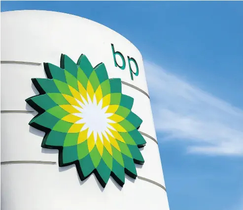  ?? CHRIS RATCLIFFE / BLOOMBERG NEWS FILES ?? A BP company logo. A London newspaper has reported on rumours that Exxon Mobil Corp. sounded out major BP shareholde­rs over a potential takeover of the British company, but many analysts remain skeptical.