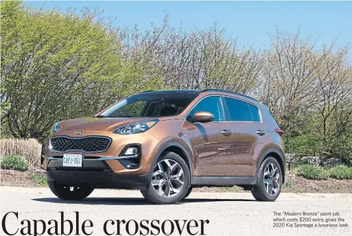  ?? JIM KENZIE PHOTOS FOR THE TORONTO STAR ?? The “Modern Bronze” paint job, which costs $200 extra, gives the 2020 Kia Sportage a luxurious look.